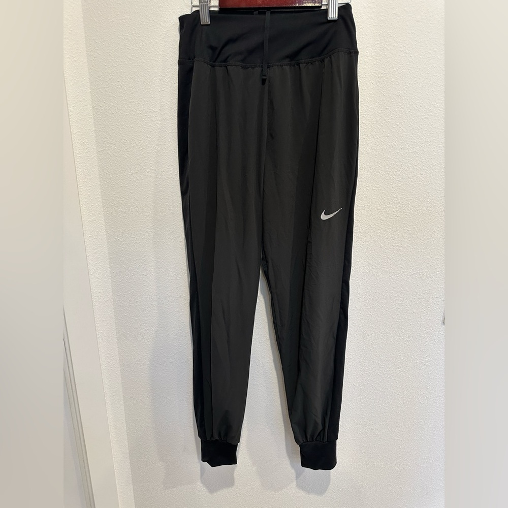 Nike black dri fit pants with cuff. Size womens xs